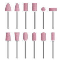 CARATTERISTICHE:  Compatibilità': Attacco universale  Sterilizzabile: Si  Grana: Fine  Forma: Varie forme  Materiale: Quarzo rosa, non si arruginisce  Utilizzo: per modellare rifinire o rimuovere la ricostruzione unghie in gel o acrilico.  CONTENUTO: 12 x punte fresa al quarzo rosa con custodia